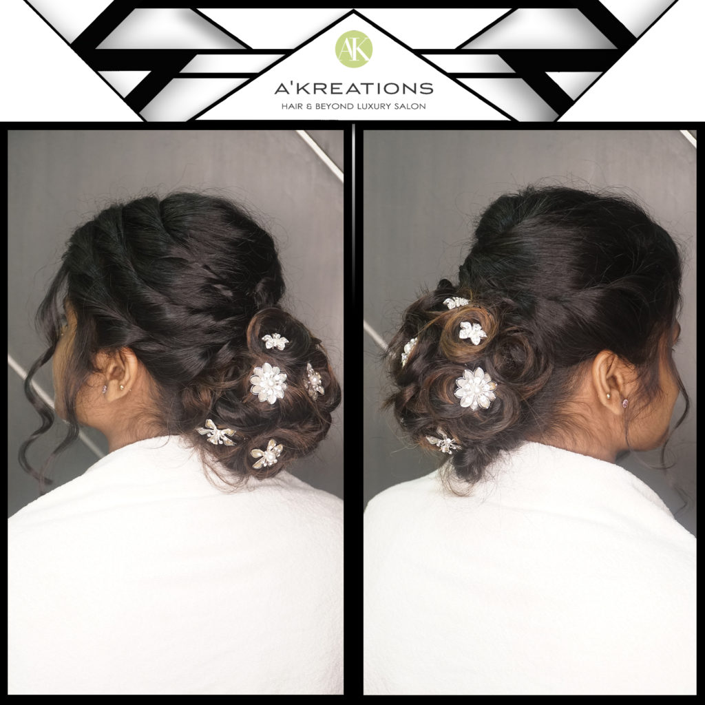 Triple one-sided twist with a voluptuous textured low bun
